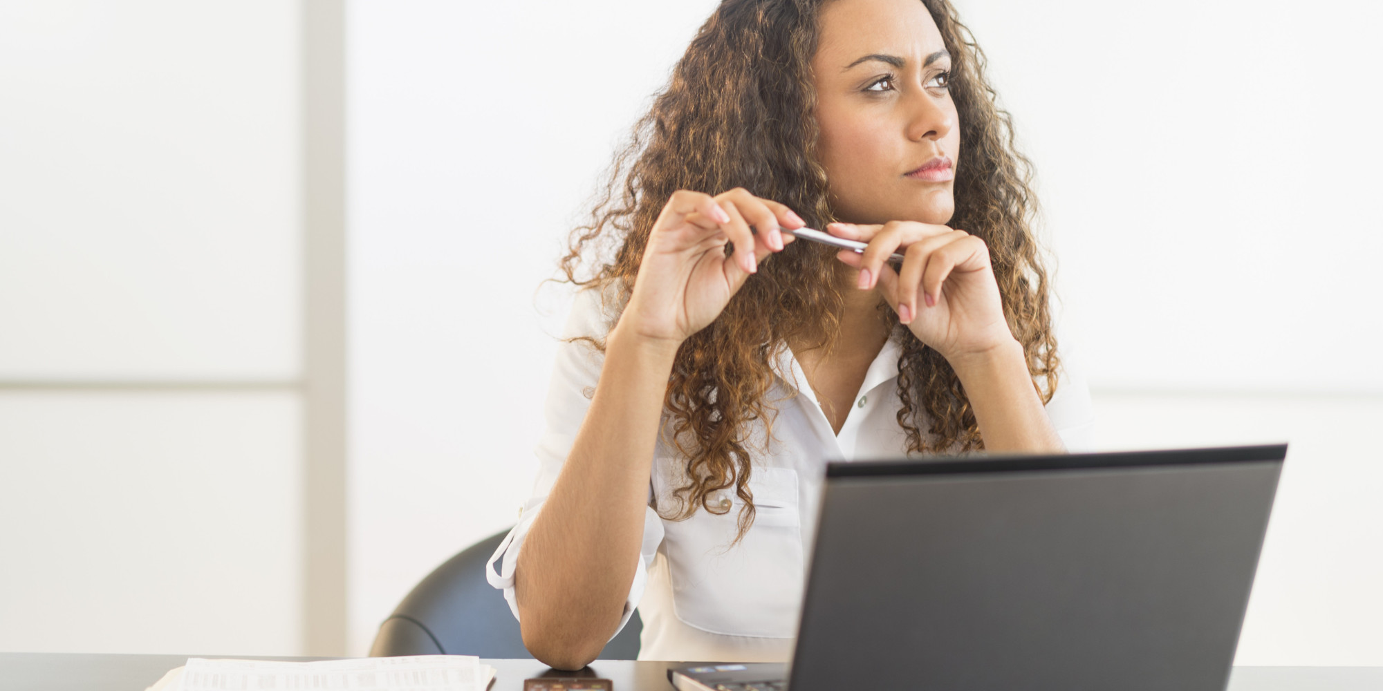 A woman thinking financially